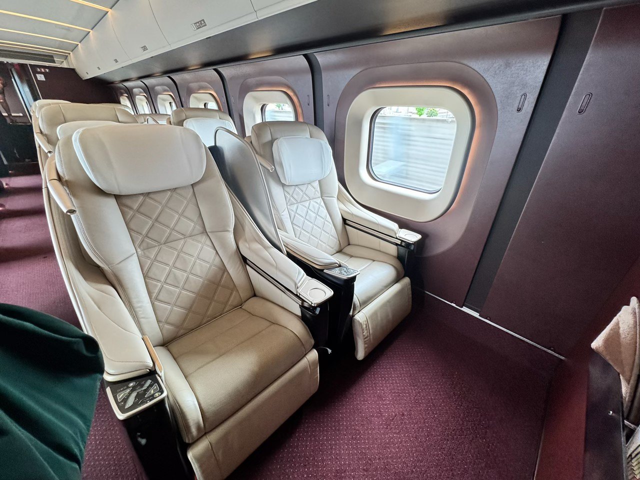 Quilted cream leather seats inside a Gran Class cabin